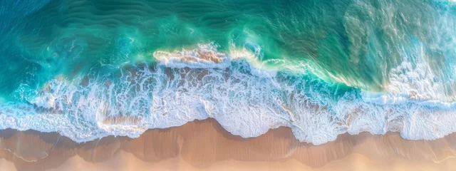  Ocean waves on the beach as a background. Beautiful natural summer vacation holidays background. Aerial top down view of beach and sea with blue water waves © JovialFox