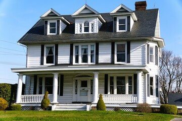 A white exterior and black roof Victorian house near Nottingham, Pennsylvania, U.S.A