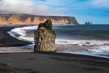 Scenic view of the picturesque Reynisfjara beach from Dyrhólaey, Iceland, with the mighty...