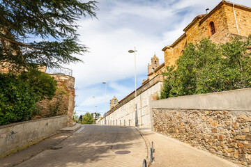 A street leading to the chapel of the Holy Veracruz in Astorga city, province of Leon, Castile and Leon, Spain - 763612921