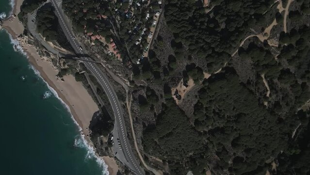 Aerial video over the coastline of Calella Spain, in Costa Brava Spain