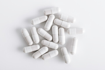 Top view of Capsule pills on white background.