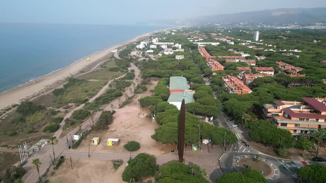Aerial video of Gav Spain coastline and people vacationing. near Barcelona Spain