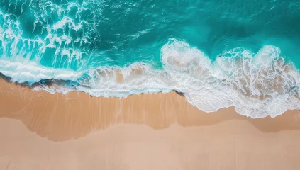 Foto op Canvas Aerial view of gentle waves on a pristine beach, where turquoise sea meets golden sand. © BackgroundWorld