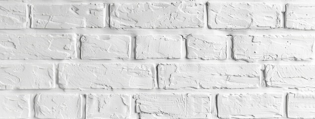 White brick wall with textured surface, providing a versatile background with ample copy space.