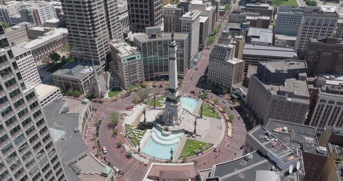 Aerial Panning Shot Of 284 Ft 6 Tall Neoclassical Monument In City On Sunny Day - Indianapolis, Indiana