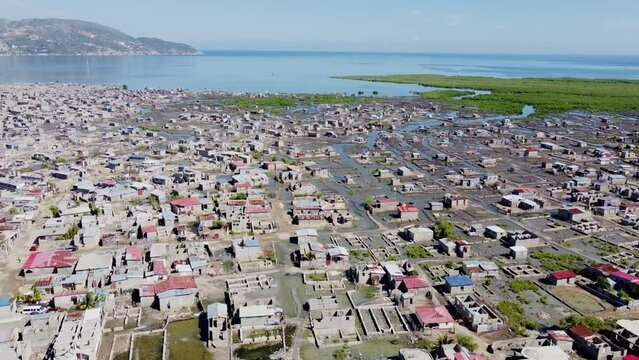 Poverty living conditions in Cap Haitien, Haiti. Flying over the small village.