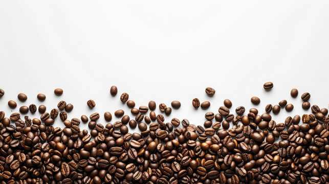 A close up of coffee beans on a white background