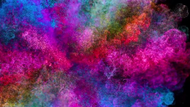 Various colored powder explosion isolated on black background. Closeup. 