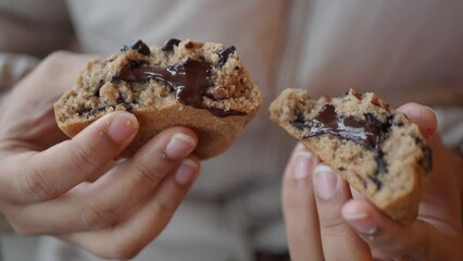  women hand breaking sweet cookies 