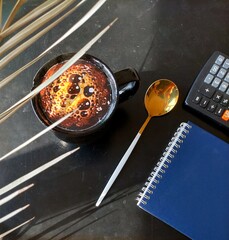 coffee, spoon and book