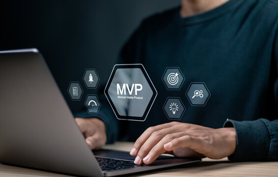 MVP, minimum viable product concept. Product development, analysis and market validation. Businessman use laptop with MVP icon on virtual screen for lean startup.