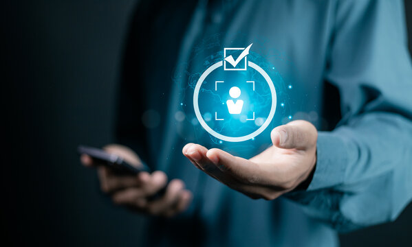 Know your customer (KYC) concept. Biometrics security. Businessman holding identity verification symbol for Increase financial security and access personal financial data.