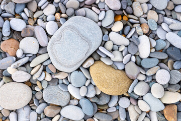 sea pebbles as a background - Powered by Adobe