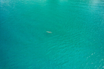 Clear blue sea on the island from above