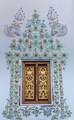 Thai Style  Temple window, Thai Temple window, golden painting window decorated with glass and ceramic