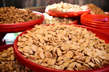 In Taiwan's markets, stalls display a variety of gluten products. Gluten, made from wheat flour, offers a chewy texture, a crucial element in Taiwan's vegetarian culture.