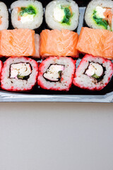 Bright beautiful rolls with fish close up
