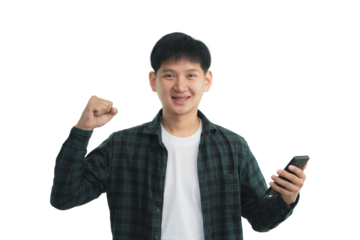 Asian young man is holding a cell phone and is smiling. He is wearing a plaid shirt and white shirt. Isolated on white background.