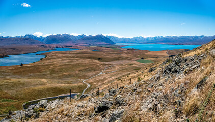 With the Southern alps in the background  Lake Alexandrina is on the left and Lake Tekapo on the right from the Mt John conservatory walk
