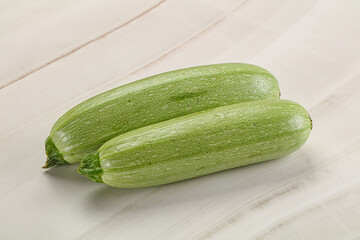 Raw green ripe zucchini vegetable
