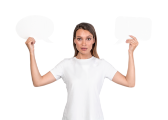 A woman in white t-shirt holding blank speech bubbles isolated on white background. Communication and success concept
