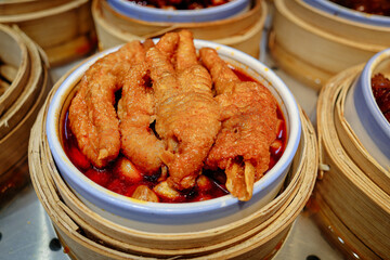 Chicken feet stewed in red chilli sauce