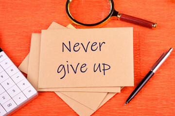 Never give up words It's written on a postal envelope