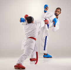 People, karate and kick to practice in studio on white background with focus to fight or train for competition. Mma, sport and glove for fitness with technique, commitment and confidence as fighter