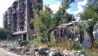 Buildings destroyed during the war in Ukraine in 2022. Destruction of the city during the war. Zone...