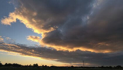 Fototapeta na wymiar A dramatic cloudy sky during golden hour
