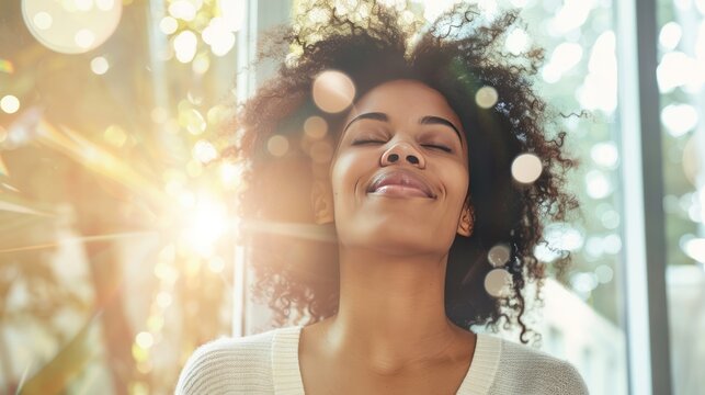 Happiness, joy, thinking positive, having good thoughts in mind. Black skin woman head in the sunshine. Mental health concept.