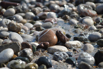 Closeup of wet sea pebbles