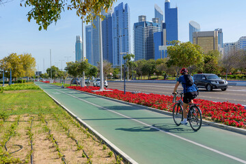 bike track overlooking the skyscrapers of Abu Dhabi, UAE. Abu Dhabi Corniche park