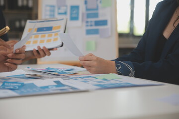 Close up ux developer and ui designer use augmented reality brainstorming about mobile app...