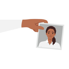 Hand holding a photo of a woman smiling. Flat vector illustration isolated on white background