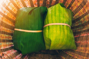 Rice wrapped in banana leaves
