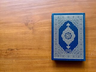 The Quran, also romanized Qur'an or Koran, is central religious text of Islam, believed by Muslims to revelation from God (Allah). Classical Arabic. Wood wooden. 