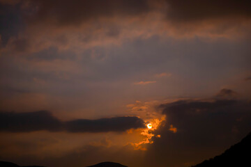 Moonlight in Cloudscape at Night in Lugano, Ticino, Switzerland.