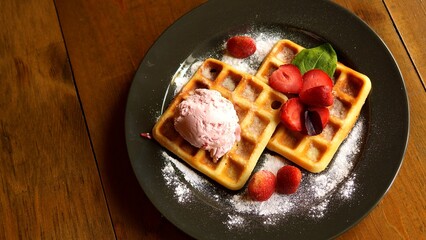 Indulge in temptation of savoring crispy waffles adorned with delectable ice cream, a sublime dessert Treat yourself to delightful dessert today Don't miss out on mouthwatering dessert experience