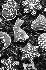 Fototapeta na wymiar Wishing Cookies. Christmas Advent Gingerbread Decorations. Top View. Black and white