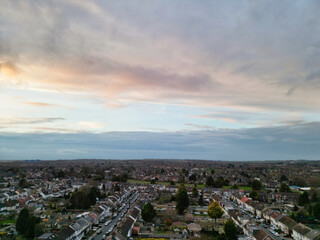 Aerial View of Residential Homes During Orange Sunset over England UK