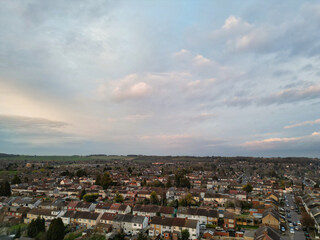 Aerial View of Residential Homes During Orange Sunset over England UK