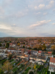 Aerial View of Residential Homes During Orange Sunset over England UK