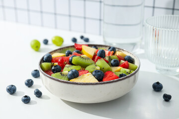 Tasty and healthy nutrition concept - fruit salad