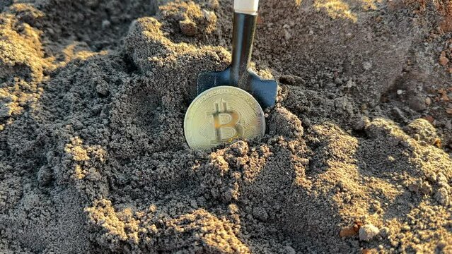 Bitcoin in soil after extraction. Сryptocurrency trading exchange. Bitcoin BTC mining, extraction. Bitcoin mining. Crypto capitalization growth. Bitcoin BTC coins mining in ground. Digger Dig a Crypto