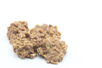 Chocolate dessert with nuts and cereals. Copyspace