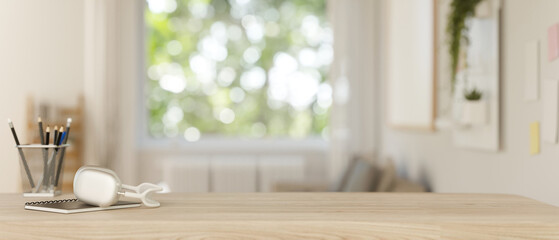 A presentation space for displaying products on a table in a bright, minimalist living room.