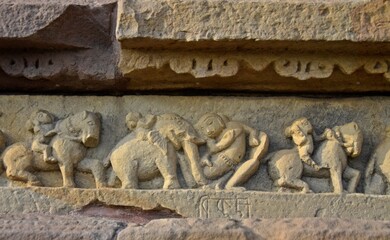 Elaborate and precise carvings in sculptures are intricate works of art created from a diverse range of materials, showcasing enchanting shapes and textures at khajuraho group of monuments, India