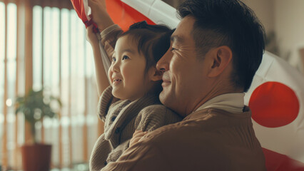 The Land of the Rising Sun: Father and Child Displaying the Japanese Flag
